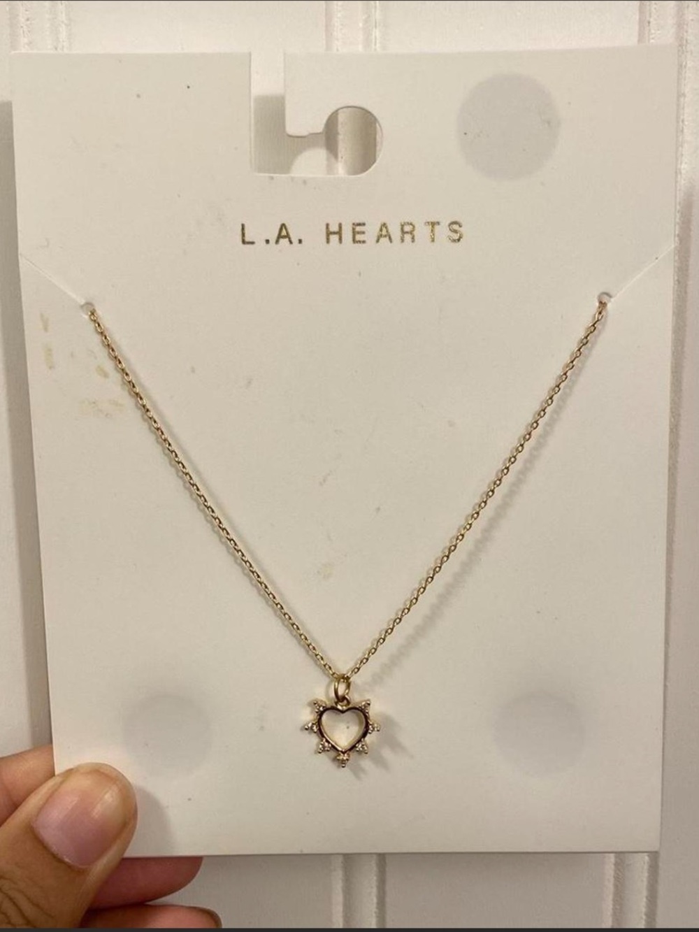gold cut out heart necklace